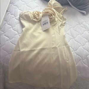 Elegant Cream Dress with Floral Detail